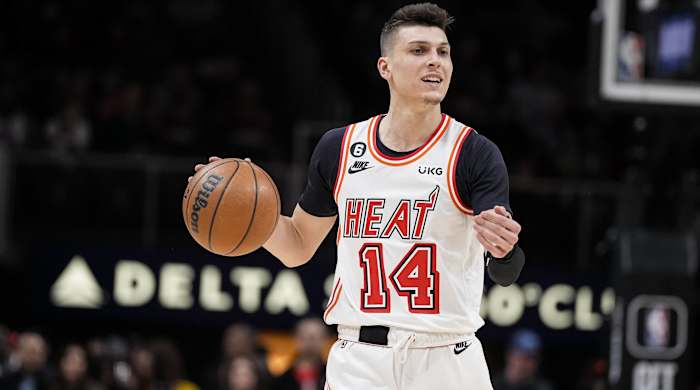 Heat guard Tyler Herro dribbles the ball in a game.